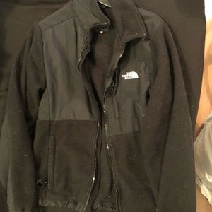 Two black north face jackets 1 is small 1 medium
